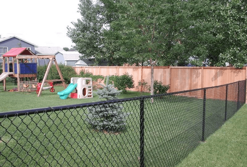 4-feet high black vinyl-coated chain link fencing for a playground.
