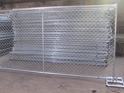 Galvanized chain link fence panel with vertical bracing.