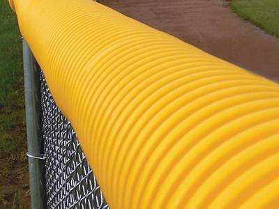 Corrugated tubing yellow top caps for chain link fence.