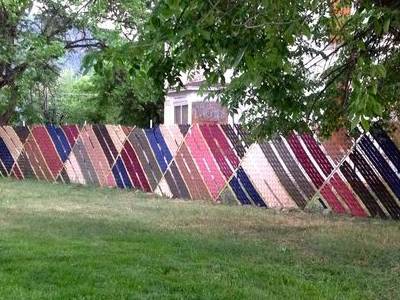 Different colors of fence weave create an attractive privacy barrier.