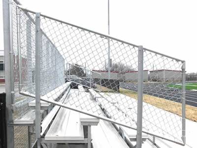 Viewing platform with galvanized stair chain link handrail in the school playground.